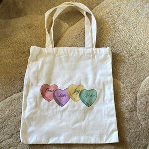 Heart Print White Tote Bag saying, “peace, love, joy. Aloha”. Approx 12” x 16”